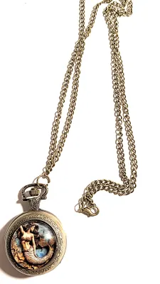 Sale Photo Thumbnail #85: Colorful Exotic MERMAID POCKET WATCH with Black Chain (30" L . Chain/Lobster Clasp) and Gold Tone Case & Setting**EXTRA BATTERY INCLUDED**

Dial: Analog
Opening: Top-Push Knob
ALL ITEMS SHIPPED FREE