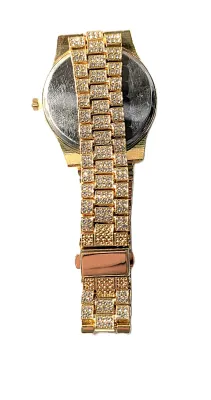 Sale Photo Thumbnail #61: RED  Round Dial BEJEWELED DIAL & BAND WATCH with Clear Stones Dial Surround + ENTIRE BAND with Stone Accents + Push Snap Closure + (3" Opening) + Date "Window" **EXTRA BATTERY INCLUDED**
QUARTZ
Non-rechargeable Battery
Brand: ALPHYNIX
ALL ITEMS SHIPPED FR