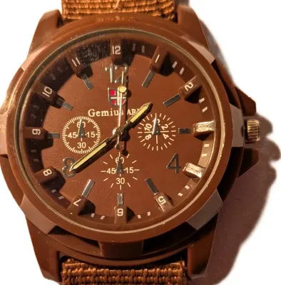 *BROWN SPORTS" WATCH with BAND: (BROWN/Canvas 9") DIAL: (1½" Brown, Acrylic Surround + ROUND) BRAND: (GEMIUS) BATTERY:...