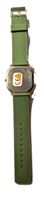 "SQUARE GREEN & GOLD" WATCH with BAND: (Green / Rubber 9") DIAL: (1½" Faint Slant Lines + SQUARE) BATTERY: Button...