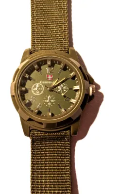*KHAKI GREEN SPORTS" WATCH with BAND: (GREEN/Canvas 9") DIAL: (1½" Green, Acrylic Surround + ROUND) BRAND: (GEMIUS)...