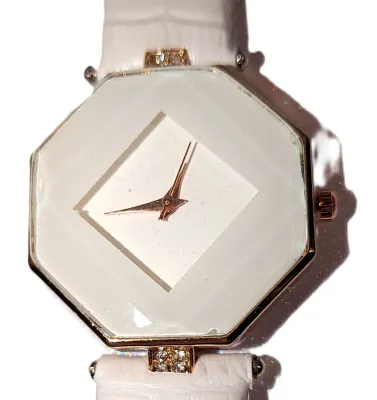 "TILTED SQUARE ON WHITE HEXAGON" WATCH with BAND: (WHITE / Rubber 8¾") DIAL: (1¼" WHITE + HEXAGON) BATTERY: Button 20...