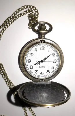 Sale Photo Thumbnail #99: Red, Blue on "Brass INDIAN-STYLE" POCKET WATCH with Brass Colored Case (1¾" Diam.) & BRASS Colored Chain (30" L . Chain/Lobster Clasp) **EXTRA BATTERY INCLUDED**

Dial: Analog 
Opening: Top-Push Knob
ALL ITEMS SHIPPED FREE