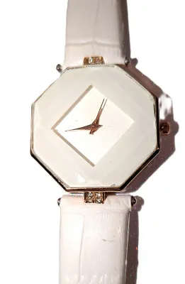 "TILTED SQUARE ON WHITE HEXAGON" WATCH with BAND: (WHITE / Rubber 8¾") DIAL: (1¼" WHITE + HEXAGON) BATTERY: Button 20...