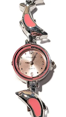 Sale Photo Thumbnail #35: Fun, Interesting DOLPHIN WATCH with Small Pink Surround Dial (¾" Diam.) and Metal Alloy Pink & Silver Colored Dolphins Band, Snap-Over Clasp on a Silver Tone STAINLESS STEEL Case Back**EXTRA BATTERY INCLUDED**

QUARTZ
Non-rechargeable Battery
Brand: ALPH