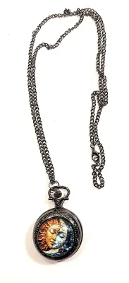 Sale Photo Thumbnail #94: Colorful "SUN & MOON" POCKET WATCH with Black Chain (30" L . Chain/Lobster Clasp) and BLACK Tone Case & Setting**EXTRA BATTERY INCLUDED**

Dial: Analog
Opening: Top-Push Knob
ALL ITEMS SHIPPED FREE