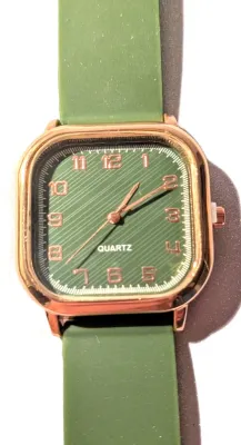"SQUARE GREEN & GOLD" WATCH with BAND: (Green / Rubber 9") DIAL: (1½" Faint Slant Lines + SQUARE) BATTERY: Button...