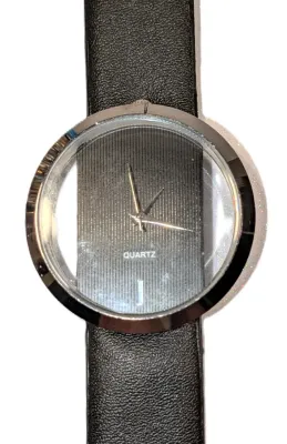 Sale Photo Thumbnail #144: BLACK "CLEAR DIAL" WATCH with BAND: (Black/Faux Leather 8¾") DIAL: (2"  CLEAR + ROUND) BATTERY: Button 20 mm  *EXTRA BATTERY INCL.*
ALL ITEMS SHIPPED FREE