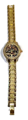 Sale Photo Thumbnail #187: Gold Colored VERY JEWELED BAND + DIAL "Celestial Amber" WATCH with BAND: (Gold Tone, Clear Stones Segments 8") DIAL: (1¼" Gold Tone with Jeweled Surround + Round) BATTERY: Button 20 mm  *EXTRA BATTERY INCL.*
ALL ITEMS SHIPPED FREE
