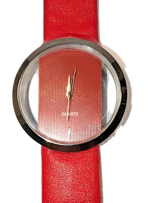 Sale Photo Thumbnail #148: RED "CLEAR DIAL" WATCH with BAND: (Red/Faux Leather 8¾") DIAL: (2"  CLEAR + ROUND) BATTERY: Button 20 mm  *EXTRA BATTERY INCL.*
ALL ITEMS SHIPPED FREE