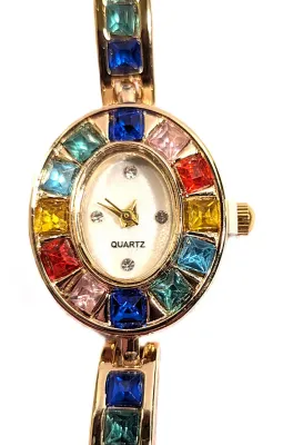Sale Photo Thumbnail #113: MULTICOLOR JEWELED OVAL WATCH with BAND: (Jeweled, Gold Color 7" Snap-Over Clasp) DIAL: (¼" Jeweled, White + Oval) BATTERY: Button 20 mm  *EXTRA BATTERY INCL.*
ALL ITEMS SHIPPED FREE