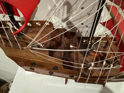 Large Handcrafted Wooden Tall Ship Model with Red Sails