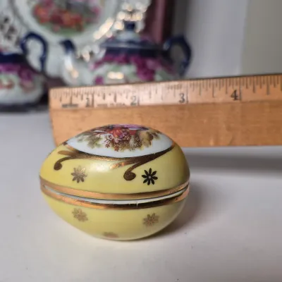 LOT 356K: Limoges Egg Trinket Box, Antique Reticulated Plate in Shadowbox Frame, Hand painted Tea Pot & Creamer