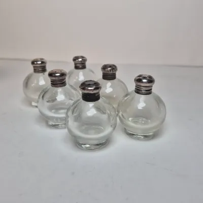 LOT 355D: Sterling Lid Salt & Pepper Shakers, Glass Coasters, Silver Plated Dome Butter Dish with Sterling Rim Plate