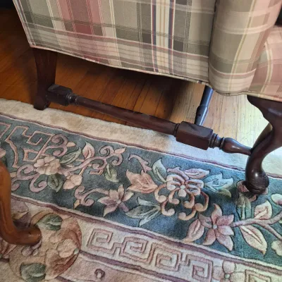 LOT 353L: Matching Upholstered His & Hers Highback Wing Chairs and Footstool