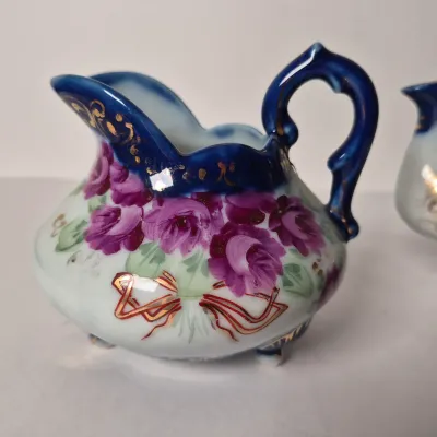 LOT 356K: Limoges Egg Trinket Box, Antique Reticulated Plate in Shadowbox Frame, Hand painted Tea Pot & Creamer