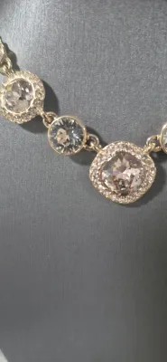 Givenchy clear stones in gold tone framework & Butterfly pin