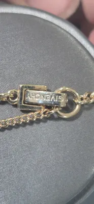 Givenchy clear stones in gold tone framework & Butterfly pin