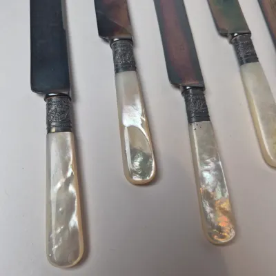 LOT 47L: Set of Antique Mother of Pearl Handled Knives with Sterling Silver Collars