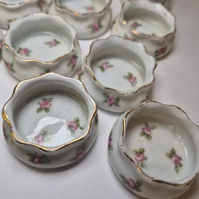 LOT 46L: Large Collection of Porcelain Salt Cellars & Set of Antique Limoges Floral Dishes