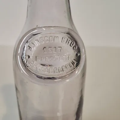 LOT 21D: Collection of Vintage Glass Bottles with Corn Cob Soap Dispenser