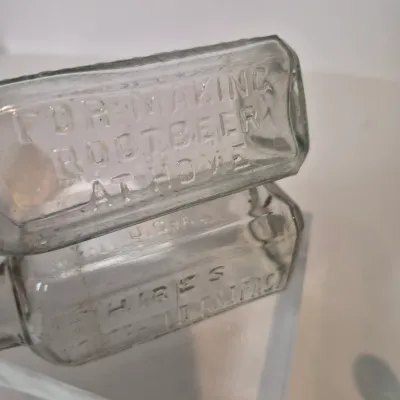LOT 21D: Collection of Vintage Glass Bottles with Corn Cob Soap Dispenser
