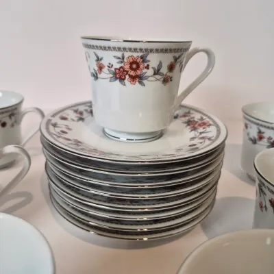 LOT 16L: Vintage Sheffield Anniversary Floral Pattern China-Service for 8-missing one cup