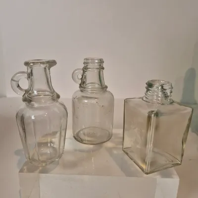 LOT 21D: Collection of Vintage Glass Bottles with Corn Cob Soap Dispenser