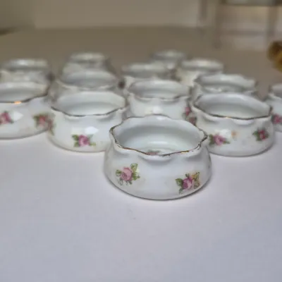 LOT 46L: Large Collection of Porcelain Salt Cellars & Set of Antique Limoges Floral Dishes