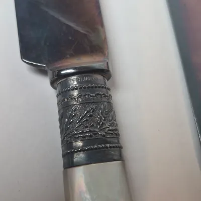 LOT 47L: Set of Antique Mother of Pearl Handled Knives with Sterling Silver Collars