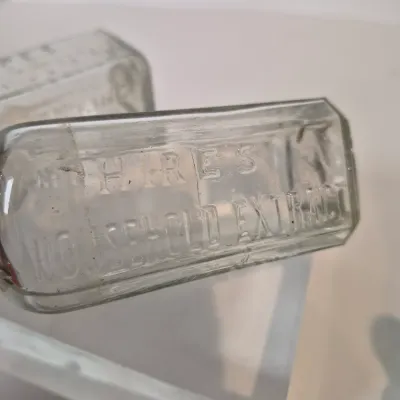 LOT 21D: Collection of Vintage Glass Bottles with Corn Cob Soap Dispenser