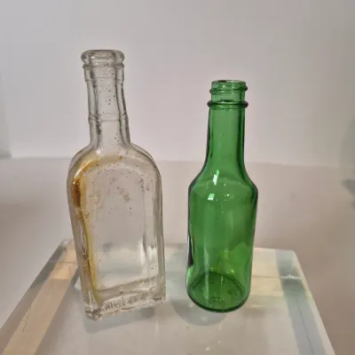 LOT 21D: Collection of Vintage Glass Bottles with Corn Cob Soap Dispenser