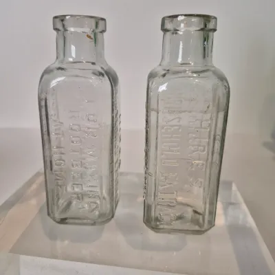 LOT 21D: Collection of Vintage Glass Bottles with Corn Cob Soap Dispenser