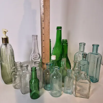 LOT 21D: Collection of Vintage Glass Bottles with Corn Cob Soap Dispenser