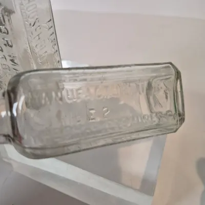 LOT 21D: Collection of Vintage Glass Bottles with Corn Cob Soap Dispenser
