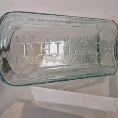 LOT 21D: Collection of Vintage Glass Bottles with Corn Cob Soap Dispenser