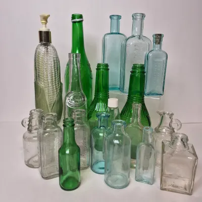 LOT 21D: Collection of Vintage Glass Bottles with Corn Cob Soap Dispenser