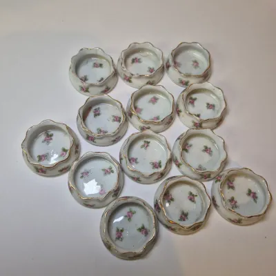 LOT 46L: Large Collection of Porcelain Salt Cellars & Set of Antique Limoges Floral Dishes