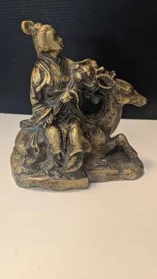 Brass Chinese Boy Sitting On A Deer