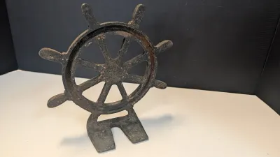 Cast Iron Ships Wheel Wedge Doorstop