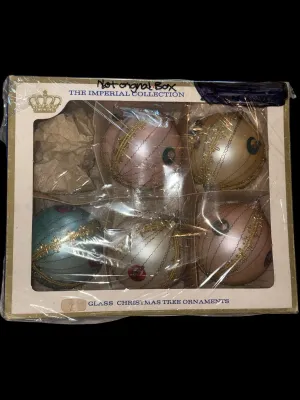 Sale Photo Thumbnail #91: Set of 5 Vintage West Germany Indent Glass Christmas Ornaments
Beautiful set of vintage West Germany glass Christmas ornaments featuring distinctive center indent reflectors, delicate crinkle wire wrapping, gold trim, and jewel-tone reflector accents. Sof