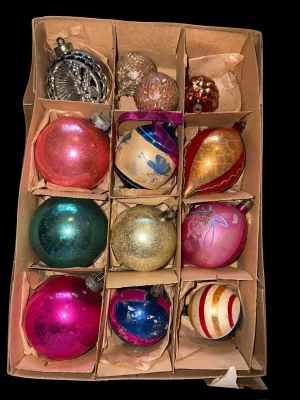 Sale Photo Thumbnail #98: A charming assortment of 13 vintage Christmas ornaments featuring both glass and plastic examples in a variety of classic holiday styles. Includes mercury glass ornaments, an indented reflector ornament, mosaic glass ornaments, a textured pinecone ornamen
