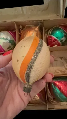Sale Photo Thumbnail #18: This one appears to be a **Santa Land** boxed set of vintage glass ornaments, likely from the **1950s–1960s**. Here's a short description that matches your style:

Vintage Santa Land Mid-Century glass Christmas ornament set in the original box. A colorf