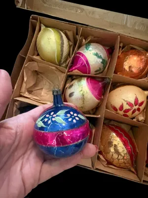 Sale Photo Thumbnail #19: This one appears to be a **Santa Land** boxed set of vintage glass ornaments, likely from the **1950s–1960s**. Here's a short description that matches your style:

Vintage Santa Land Mid-Century glass Christmas ornament set in the original box. A colorf