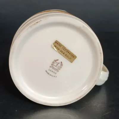 LOT 145: Lenox 8.25" Lily of the Valley Vase, Nantucket Handled Candle Holder, Floral Basket & New Years 2000 Trinket