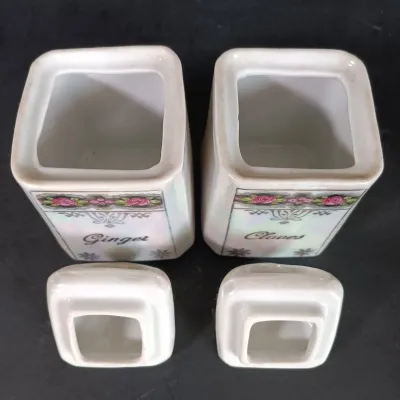 LOT 23: M Rosenbaum Bavarian Made Spice Canisters with Victoria Czechoslovakia Tea Canister