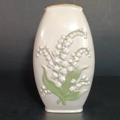 LOT 145: Lenox 8.25" Lily of the Valley Vase, Nantucket Handled Candle Holder, Floral Basket & New Years 2000 Trinket