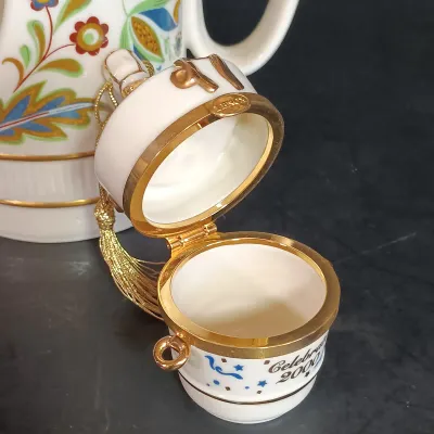 LOT 145: Lenox 8.25" Lily of the Valley Vase, Nantucket Handled Candle Holder, Floral Basket & New Years 2000 Trinket