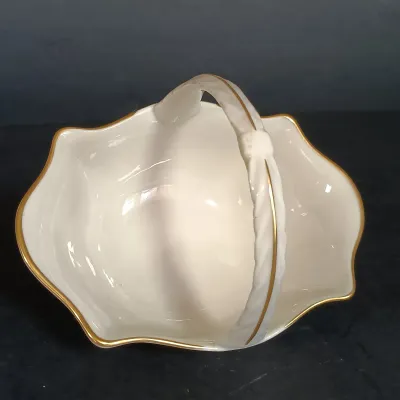 LOT 145: Lenox 8.25" Lily of the Valley Vase, Nantucket Handled Candle Holder, Floral Basket & New Years 2000 Trinket
