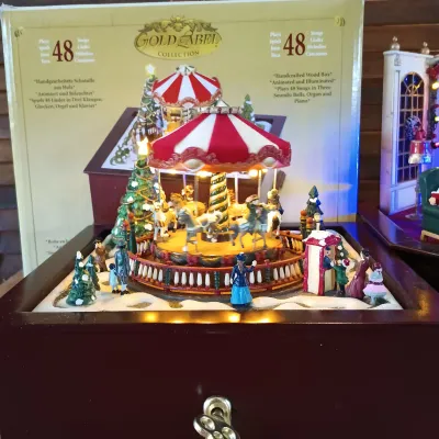 LOT 248: Mr Christmas Holiday Music Box & Gold Label Deluxe Music Box Carousel